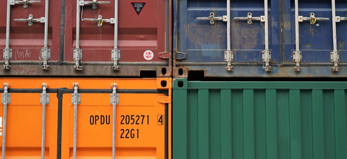 an image of different colour shipping containers