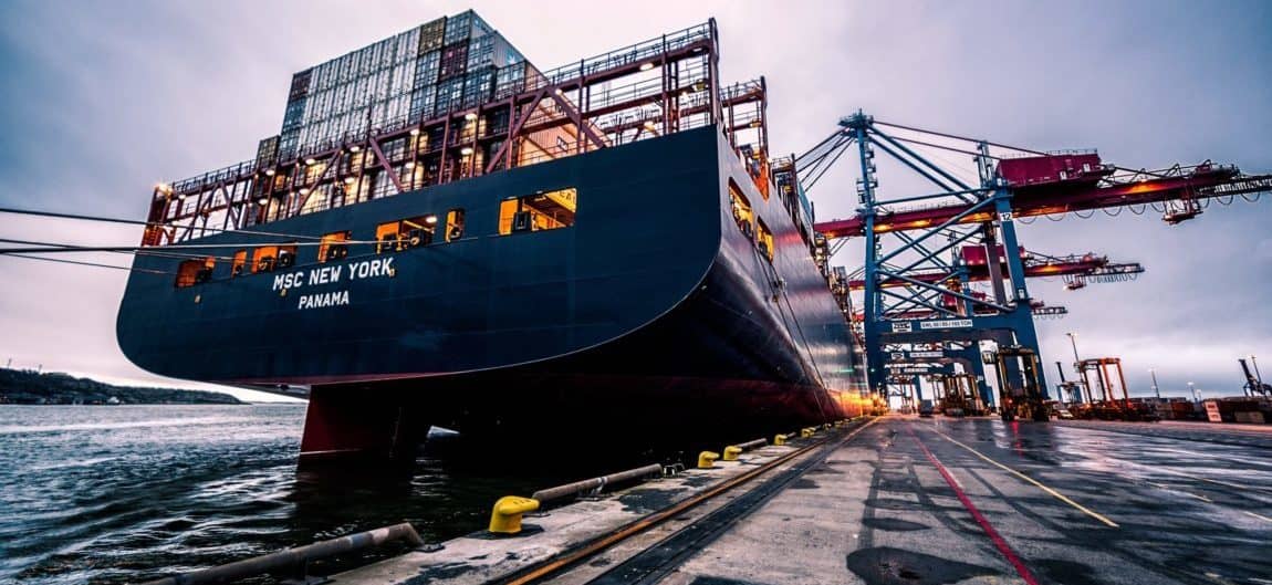 Photo shows the back of the MSC New York containership docked at a port