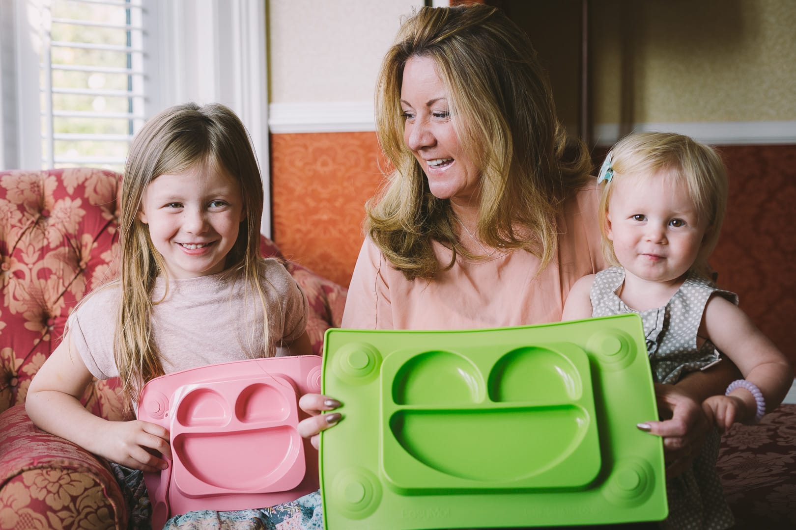 a picture of Helen with two children and her easy mat product